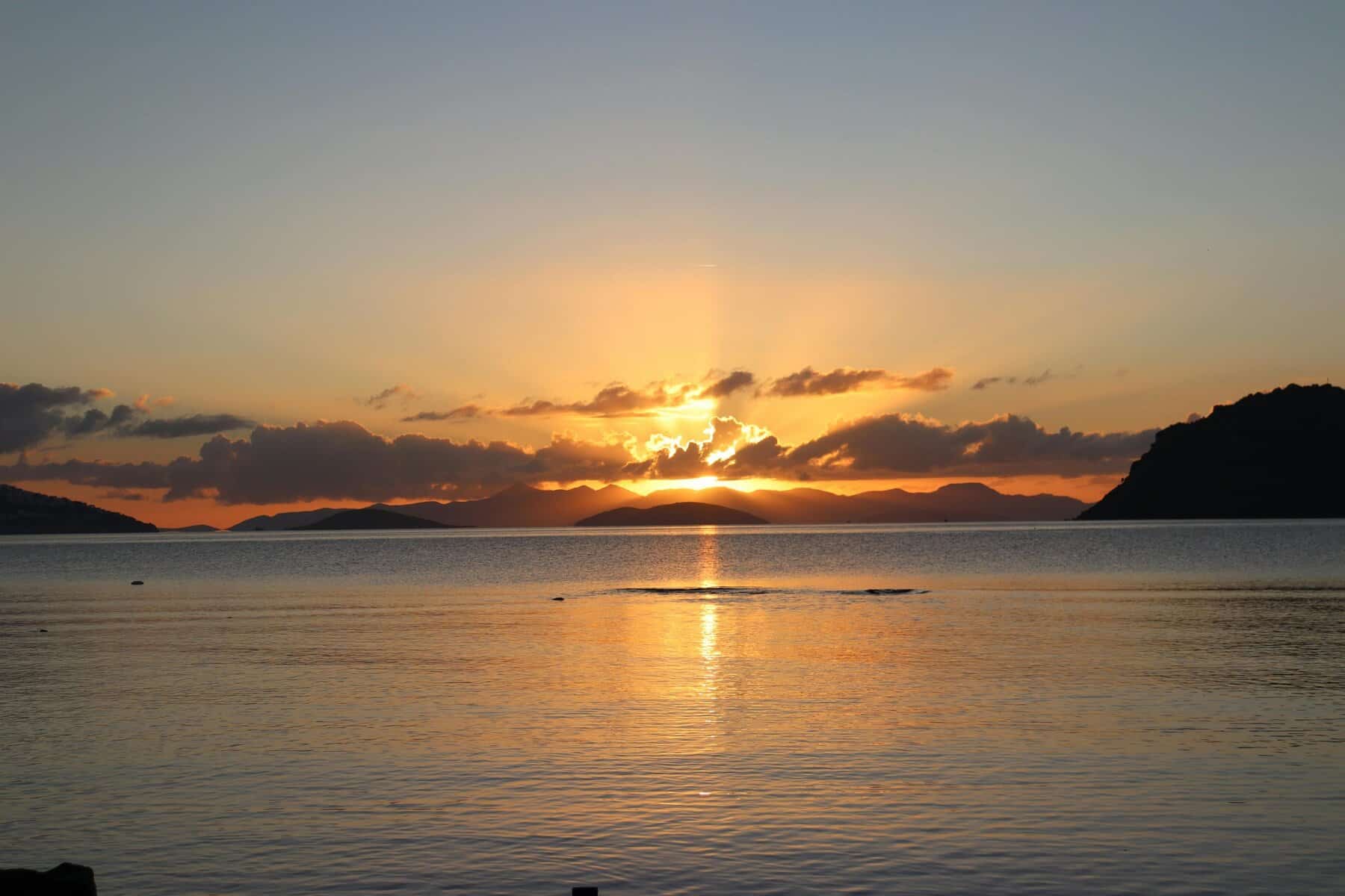 practical-mysticism-begins-by-entering-apollos-world.jpg The dawn of practical mysticism: divine light piercing clouds to illuminate the sacred shore where Apollo's world meets ours