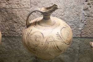 Ancient Greek vase with spiral design symbolizing the Sacred Way - the inward journey from mundane reality to divine connection with Apollo