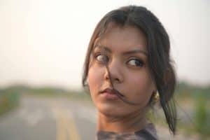 A woman looking sideways, waiting, watching, stranded on the sidelines of life. It was keeping me from beginning my heroine's journey.