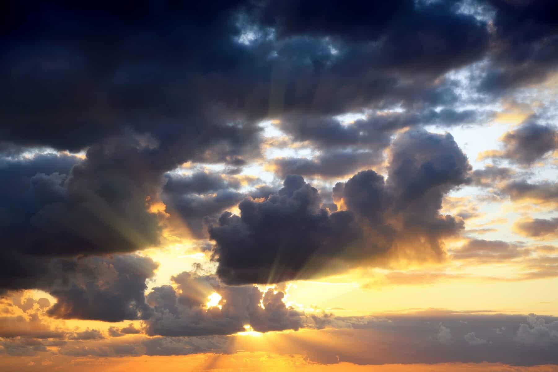 Apollo, God of Truth, and golden sunlight breaking through dark storm clouds—hope piercing through darkness, the promise of a new dawn.